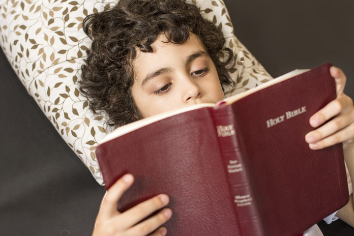 Child reading the Bible