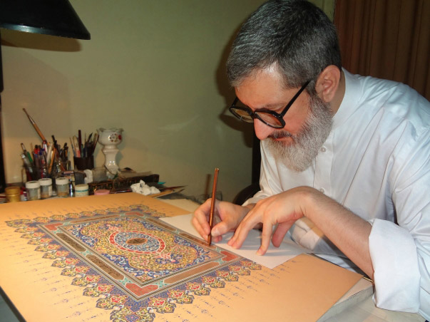 Ayatollah Tehrani creating calligraphic work for Baha'is