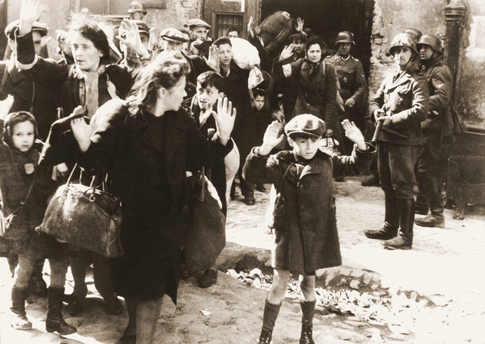 People being forced into a ghetto in Warsaw, Poland 1943