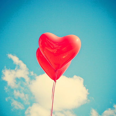 Heart Shaped Balloon in blue sky