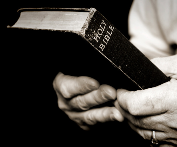 Man-holding-bible