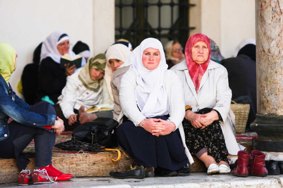 Moslem women sitting on the steps of a mosque in Sarajevo ,Bosnia