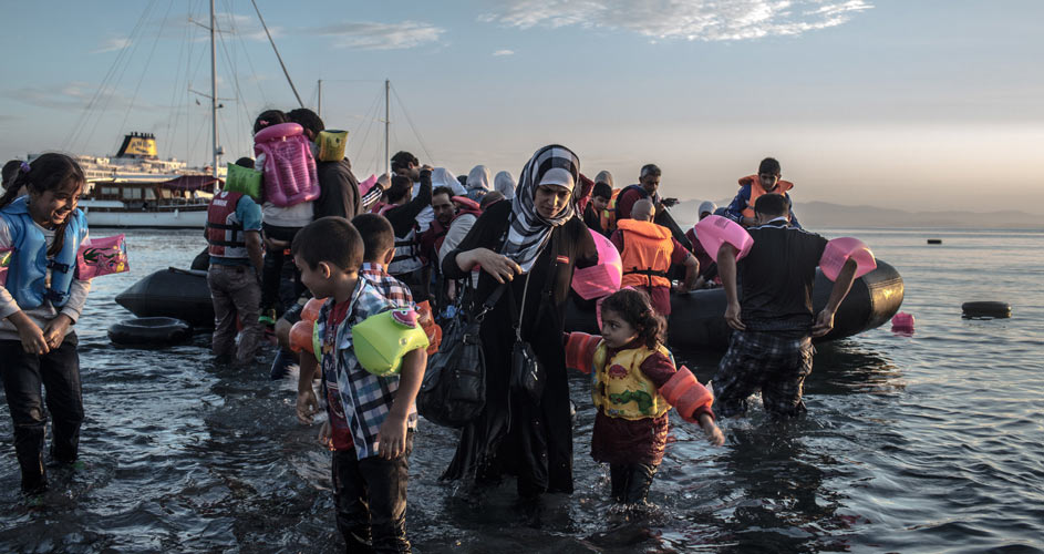 Syrian migrants landing on the shores of Greece