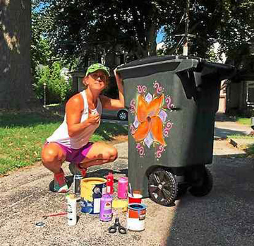 Esther Cohen-Eskin painting her trash can.
