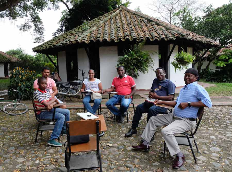 Some members of the team for the reforestation project meet to discuss their plans for the Bosque Nativo.