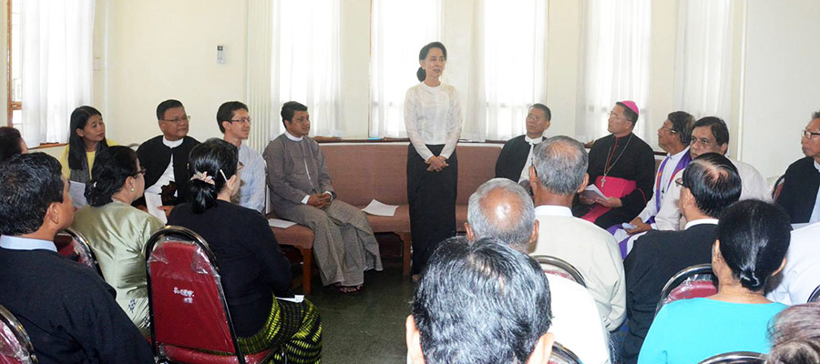 Aung San Suu Kyi gives a speech at an interfaith memorial service on 19 July. (Photo courtesy of Myanmar's Ministry of Information)