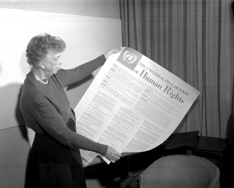 Eleanor Roosevelt, chair of the UN Human Rights Commission, holds the historic document.