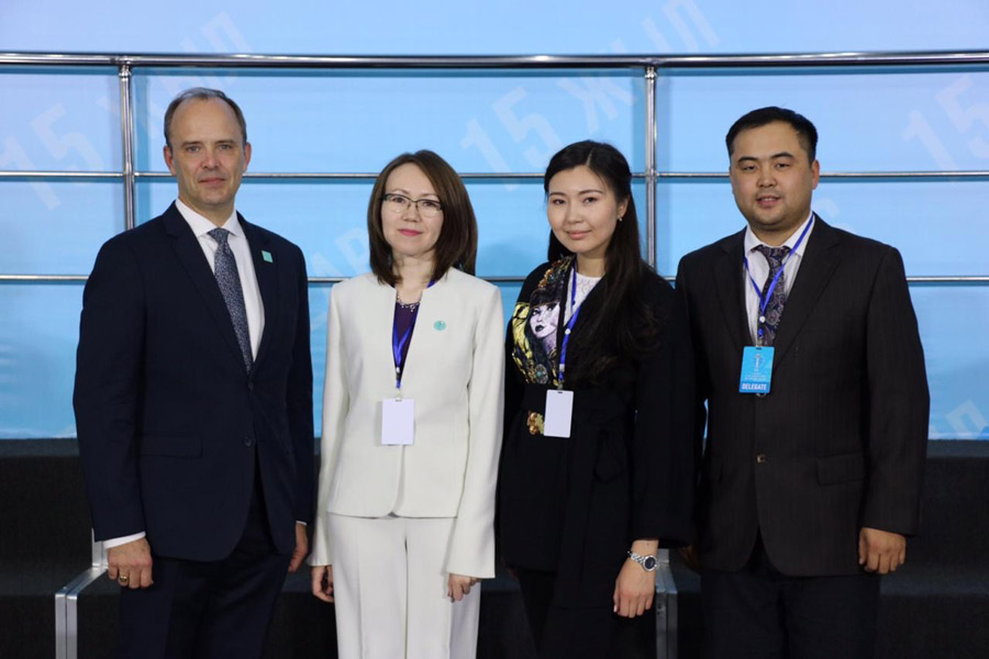 (from left) Joshua Lincoln, Secretary-General of the Baha’i International Community; representative Lyazzat Yangaliyeva from the Baha’i community of Kazakhstan; Guldara Assylbekova of the International Center of Cultures and Religions; and Serik Tokbolat, also representing the Baha’i community of Kazakhstan.
