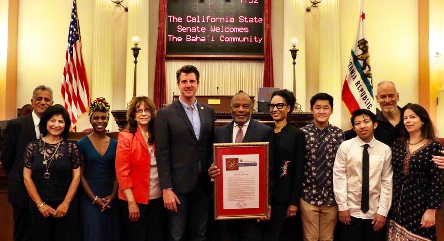 Members of Baha’i communities in California pose for a picture with state Senator Henry Stern (fifth from the left).