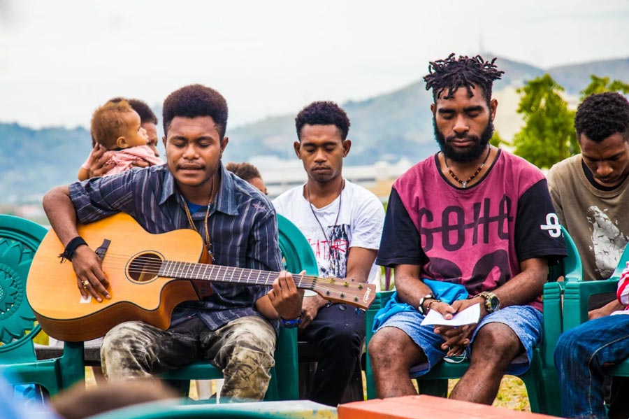 Prayers and music inspire attendees of a devotional gathering held at the site of the future Bahá’í House of Worship in Port Moresby, Papua New Guinea. In honor of the historic bicentenary, young people at the gathering also presented about the life of the Báb.