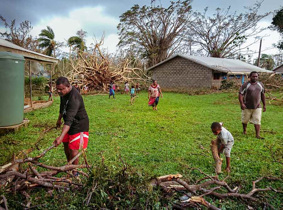 Local community members begin cleanup work at a school after Espiritu Santo, Vanuatu, was struck by Cyclone Harold. The degree of unity and collective action fostered through the educational activities of the Baha’i community, including Preparation for Social Action (PSA), has enabled many people to respond swiftly and to begin rebuilding and replanting.