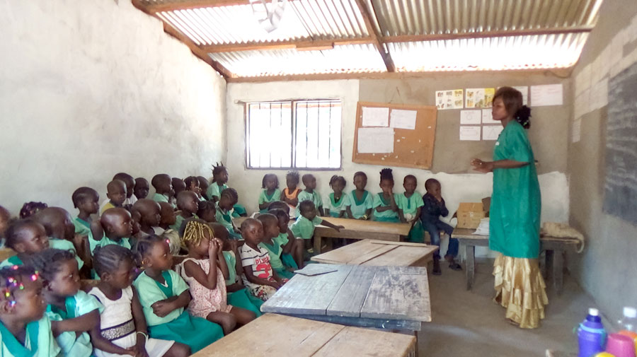 Photograph taken before the current health crisis. A class at a community school in Bangui, Central African Republic. A Baha’i principle underlying these schools is that local communities can be protagonists in providing education for their children.