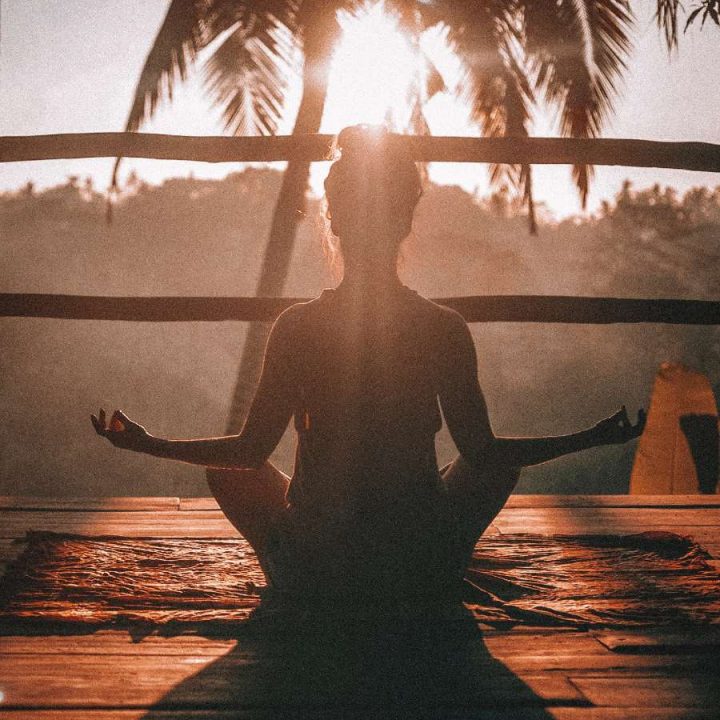 A morning yoga session peering into the jungle in Ubud, Bali.
