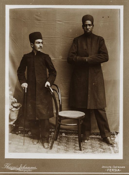 Wealthy Persian boy with African slave.