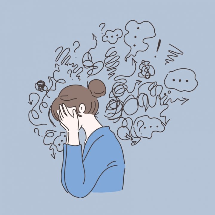 An illustration of a woman with anxious thoughts