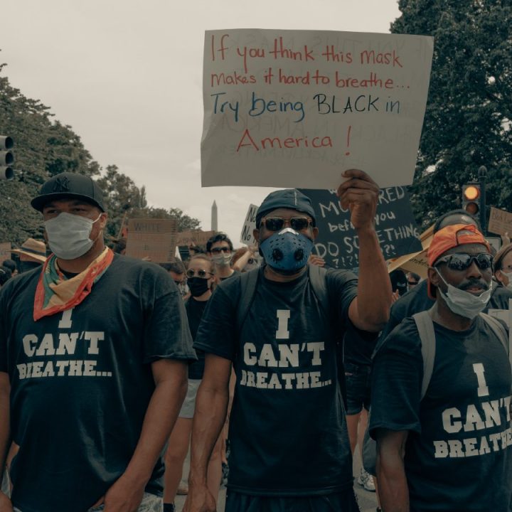 Men stand in unity at the Black Lives Matter protest in Washington DC 6/6/2020