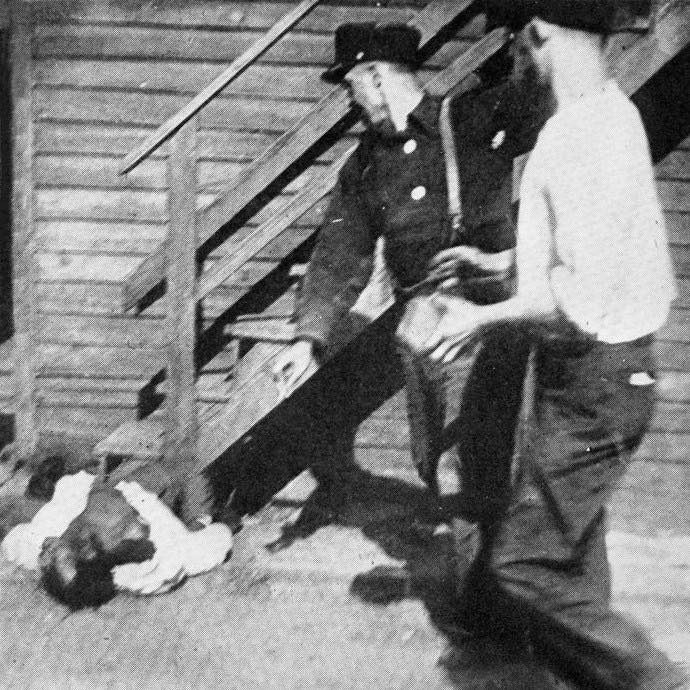 African American being stoned by whites during 1919 Chicago race riot