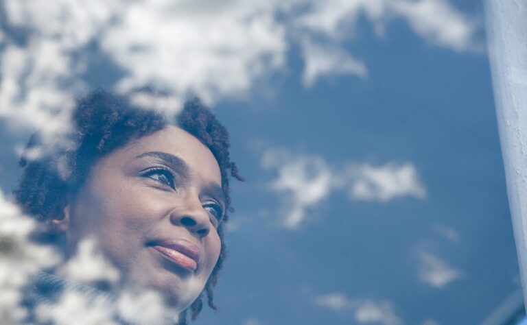 woman looking at clouds