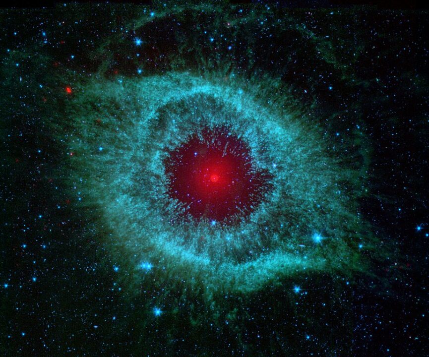 This infrared image from NASA's Spitzer Space Telescope shows the Helix Nebula, a cosmic starlet often photographed by amateur astronomers for its vivid colors and eerie resemblance to a giant eye.
The nebula, located about 700 light-years away in the constellation Aquarius, belongs to a class of objects called planetary nebulae.
