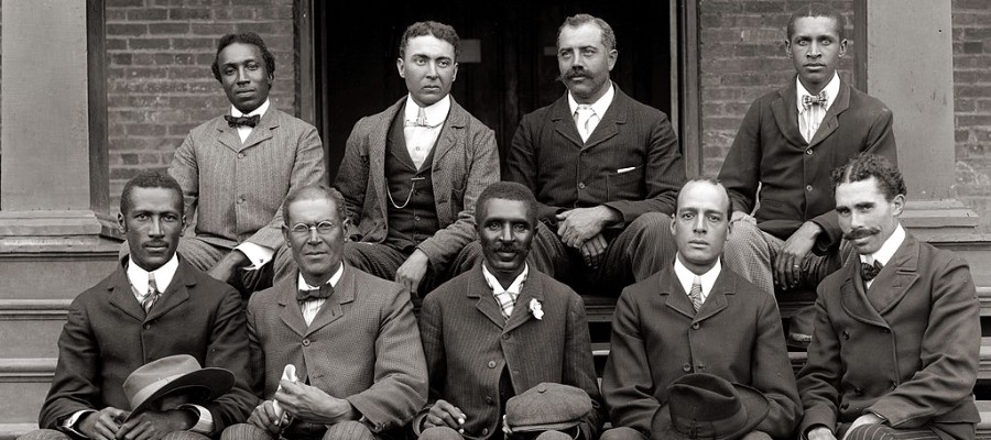 George Washington Carver (front row, center) poses with fellow staff members at the Tuskegee Institute (now known as Tuskegee University) located in the U.S. state of Alabama.